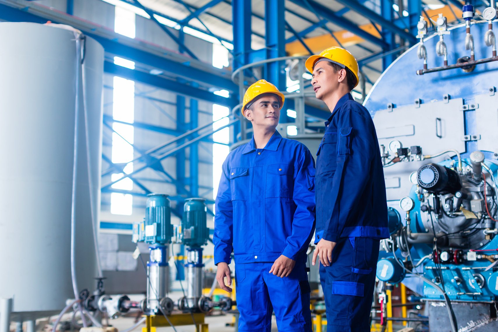 Worker in Asian Manufacturing Plant